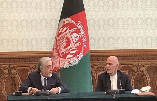 Afghan President Ghani and rival Abdullah sign power-sharing deal