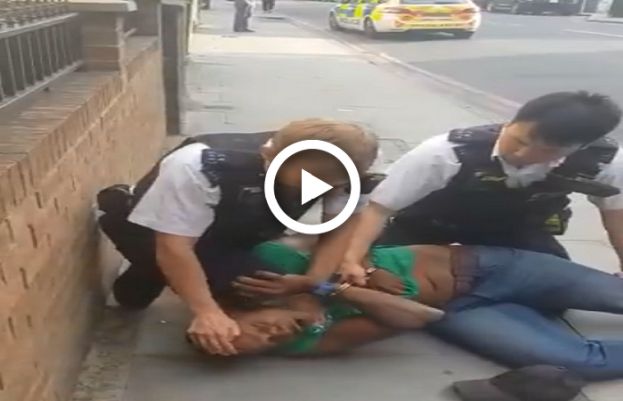 ondon’s police force suspended an officer on Friday after video footage emerged of him appearing to kneel on the head and neck of a Black man 