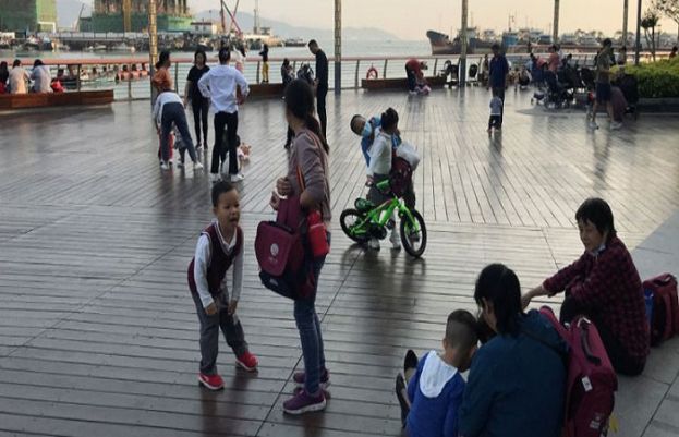 China, in major policy shift, announces families can have three children