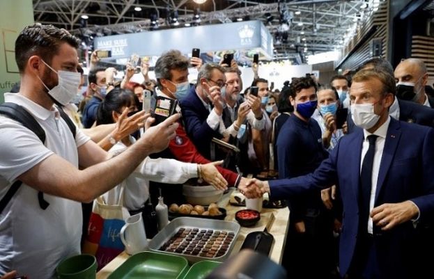 French president egged by protester shouting 'long live revolution'