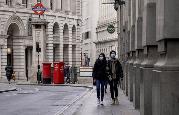 At least one dead from Omicron as UK boosts response