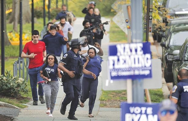 Gunman takes own life after wounding four near elite Washington school