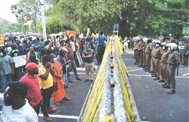 Sri Lankan president loses parliamentary majority as protests mount