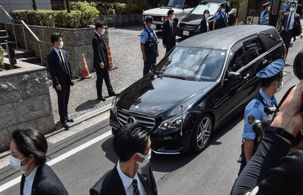 Shinzo Abe&rsquo;s body returns to his home as Japan grieves for slain ex-PM