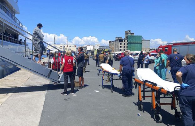 Survivors arrive by yacht after a rescue operation at the port in Kalamata town, about 240 kilometers southwest of Athens on Wednesday, June 14, 2023.